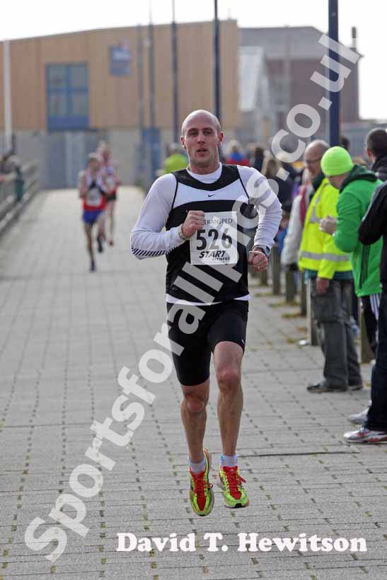 Mark McLeod finishing the Transped Blyth Valley 10k.